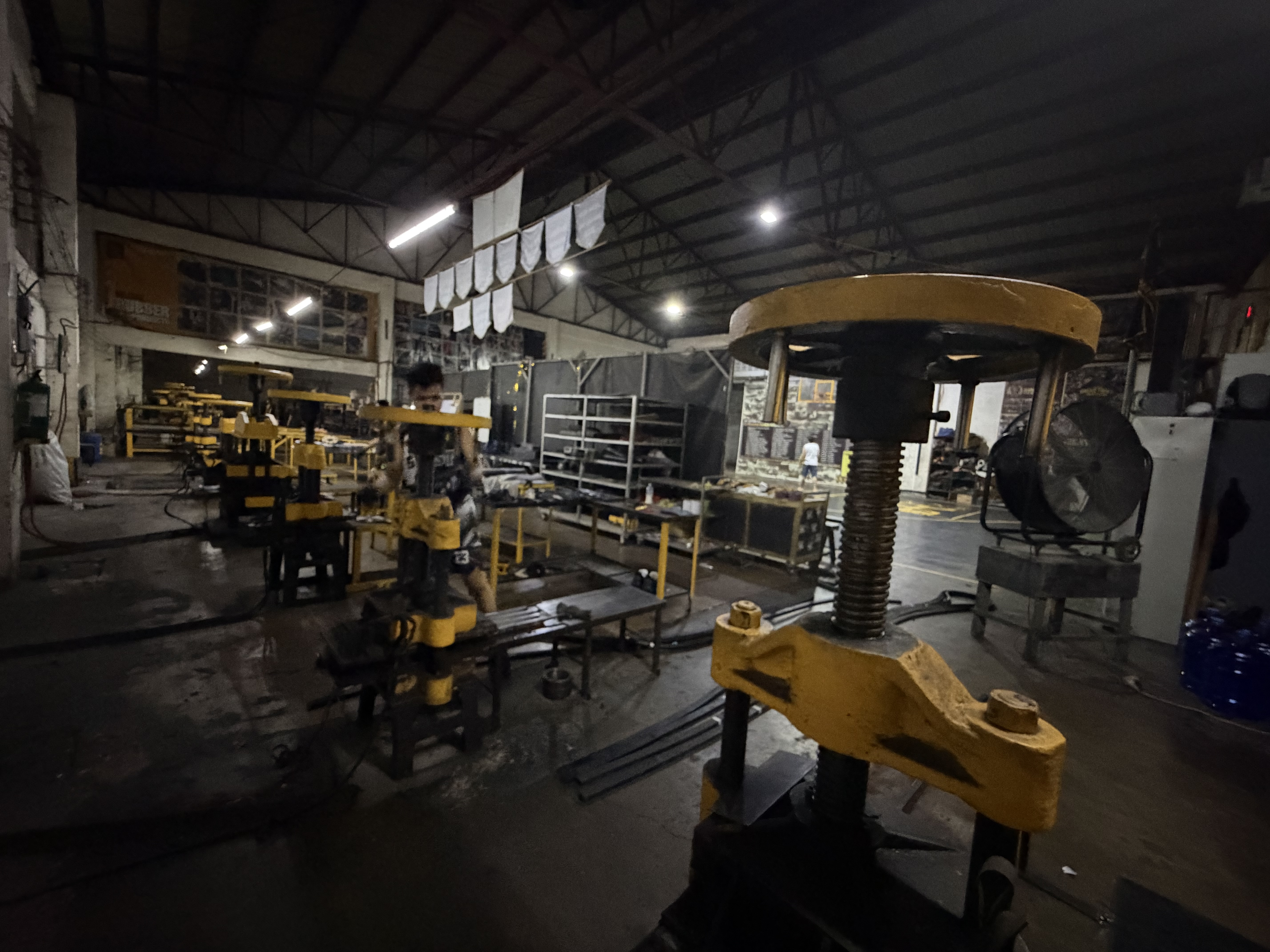 RK Rubber industrial molding presses in the manufacturing facility